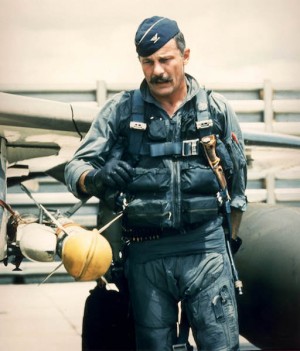 Christina Olds Visits Seymour Johnson AFB 11 Col. Robin Olds preflights his F-4C Phantom before a mission in Southeast Asia. He was the commander of the 8th Tactical Fighter Wing at Ubon Air Base, Thailand, and was credited with shooting down four enemy MiG aircraft in aerial combat over North Vietnam. (U.S. Air Force photo)