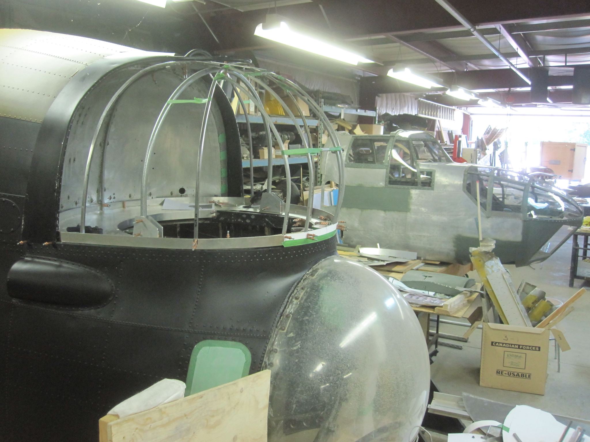 Greenwood Military Aviation Museum - An Undiscovered Gem 20 Reconstruction of the Lancaster's nose section continues apace in the foreground, with the Bolingbroke sitting behind. (GMAM photo)