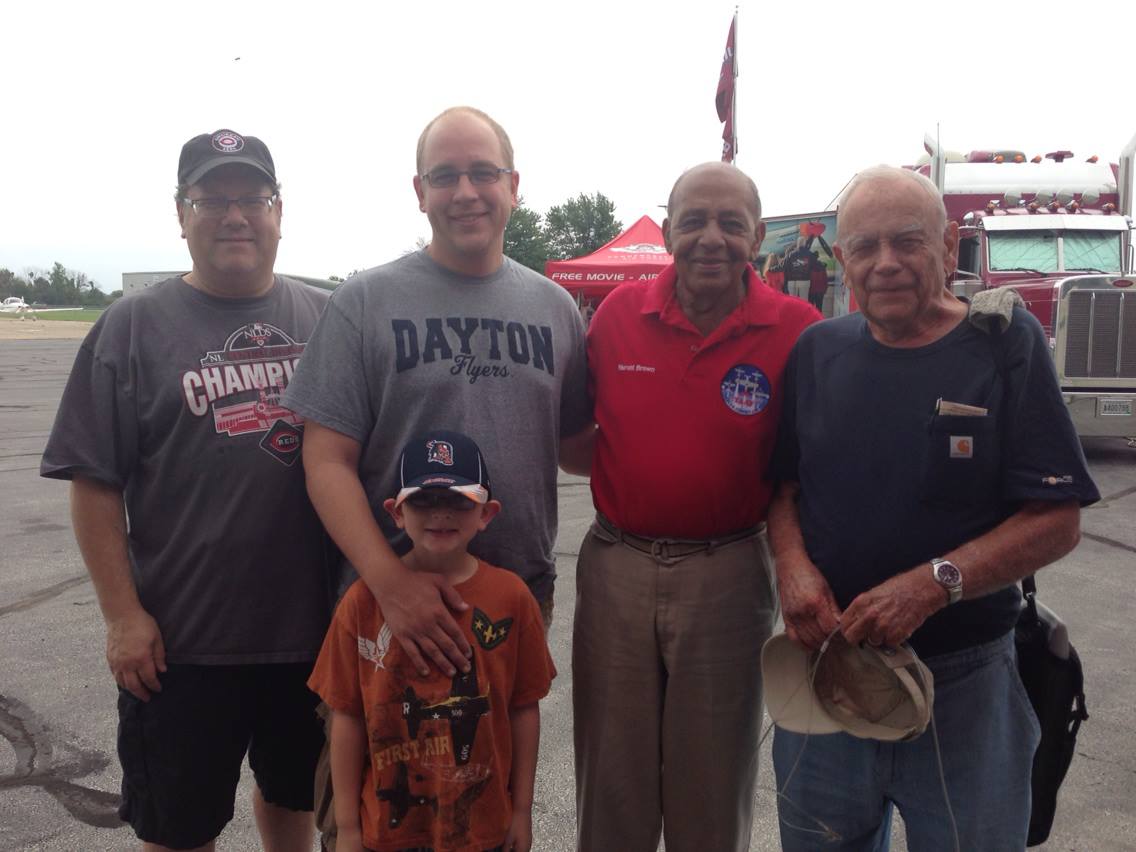Wings and Warbirds Over Port Clinton 2015 12 Tuskegee Airman Dr. Harold Brown will be at Wings & Warbirds Over Port Clinton, and is sure to offer fascinating insight into his WWII experiences. Here he is shown with John Lambert, Timothy Brunner, Warbirds News staff writer Mike Lambert, and his son Tyler. (photo via Mike Lambert)