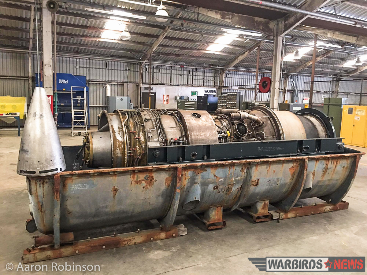 F-100 Super Sabre - August, 2016 Restoration Report 16 Checking that the F-100's engine has all of the necessary components attached. (photo by Aaron Robinson)