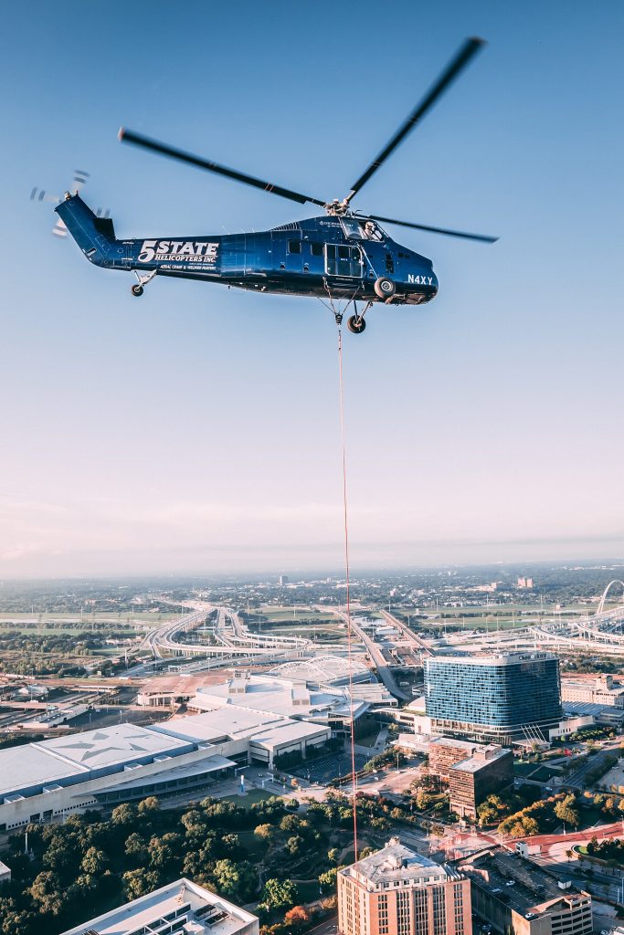 Today in Aviation History: First Flight of the Sikorsky H-34 15 1440px S 58T stationed in Fate TX performing a helicopter lift operation