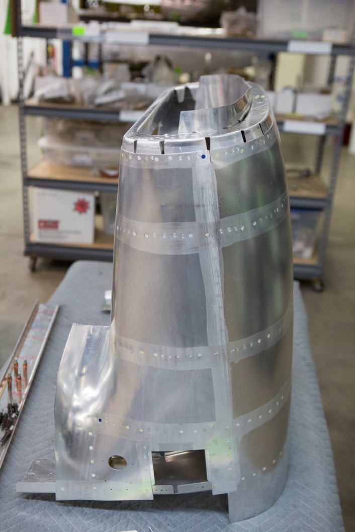 Texas Flying Legends P-51C Restoration Report 18 In another photograph from October, 2015 is a shot of the beautiful craftsmanship of the oil cooler air scoop. (photo via AirCorps Aviation)