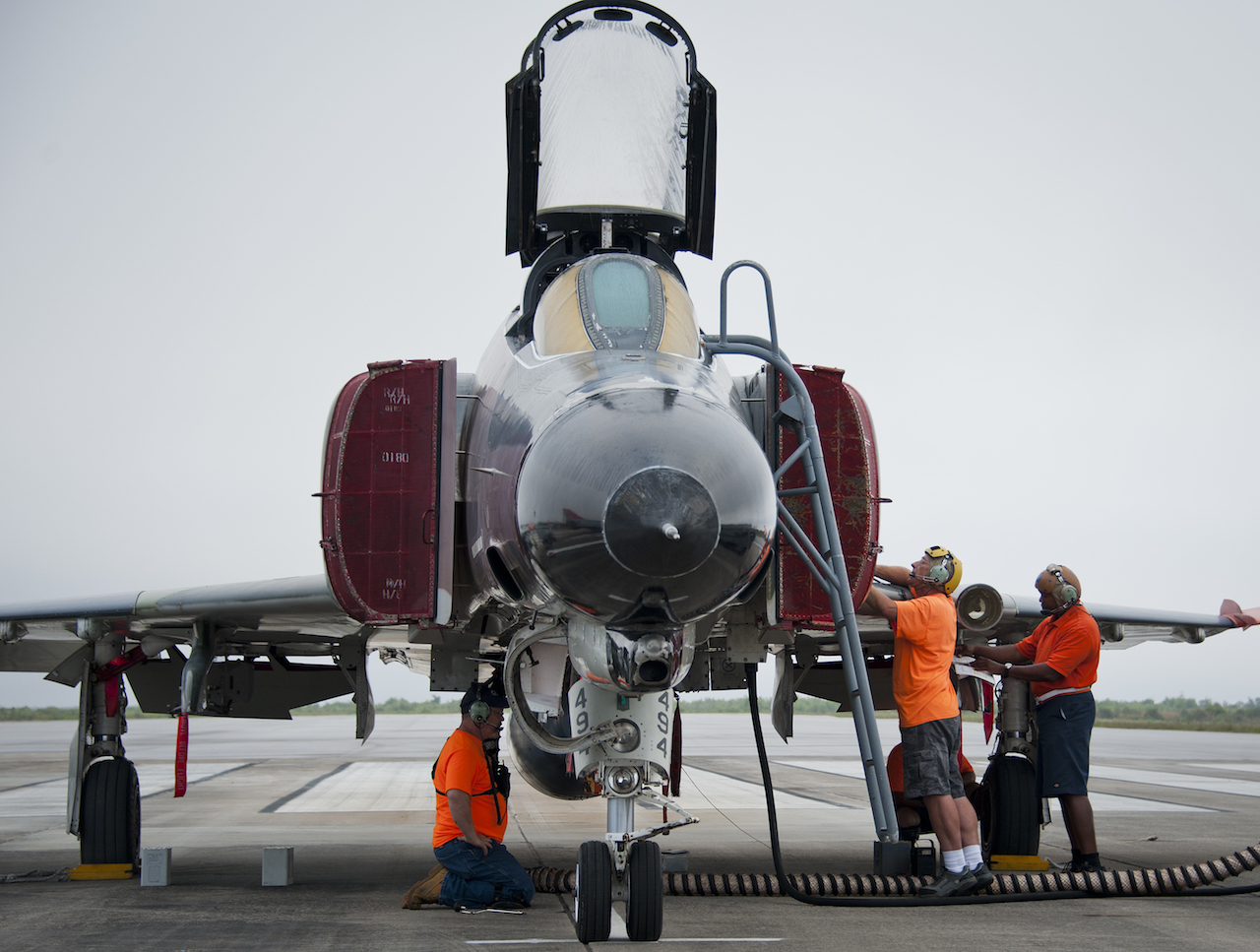 Retiring QF-4 stops in at Aviation Nation 11 Maintainers with PAE prepare a QF-4 for takeoff on the drone runway May 12 at Tyndall Air Force Base, Fla. This unmanned QF-4 was used as a full-scale target and shot down by a pilot from the 177th Fighter Wing, a New Jersey Air National Guard unit, who were participating in Combat Archer. Combat Archer is the air-to-air component of the 53rd Wing’s weapons system evaluation program. The 82nd Aerial Targets Squadron operates QF-4, QF-16 and BQM-167 targets to provide manned and unmanned aerial targets support for programs across the Department of Defense. The QF-4 mission for the 82nd ATRS at Tyndall came to an end in May, with the squadron transitioning to QF-16s for all future full-scale target operations. (U.S. Air Force photo/Sara Vidoni)