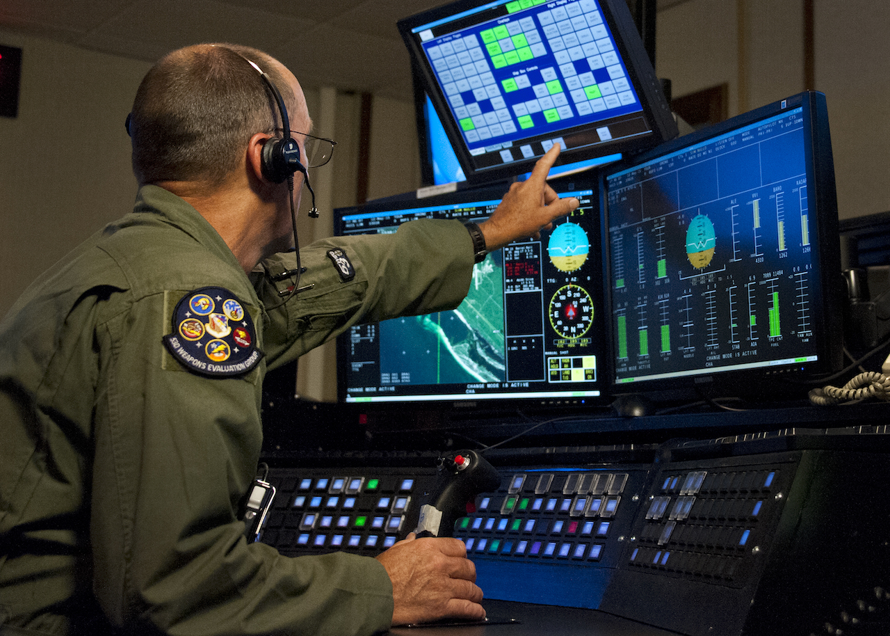 Retiring QF-4 stops in at Aviation Nation 12 Retired Lt. Col. Thomas Mudge, a ground controller for the 82nd Aerial Targets Squadron, remotely pilots a QF-4 during a Combat Archer mission May 12 at Tyndall Air Force Base, Fla. The unmanned QF-4 was used as a full-scale target and shot down by a pilot from the 177th Fighter Wing, a New Jersey Air National Guard unit participating in the operation. Combat Archer is the air-to-air component of the 53rd Wing’s weapons system evaluation program. The 82nd ATRS operates QF-4, QF-16 and BQM-167 targets to provide manned and unmanned aerial targets support for programs across the Department of Defense. (U.S. Air Force photo/Sara Vidoni)
