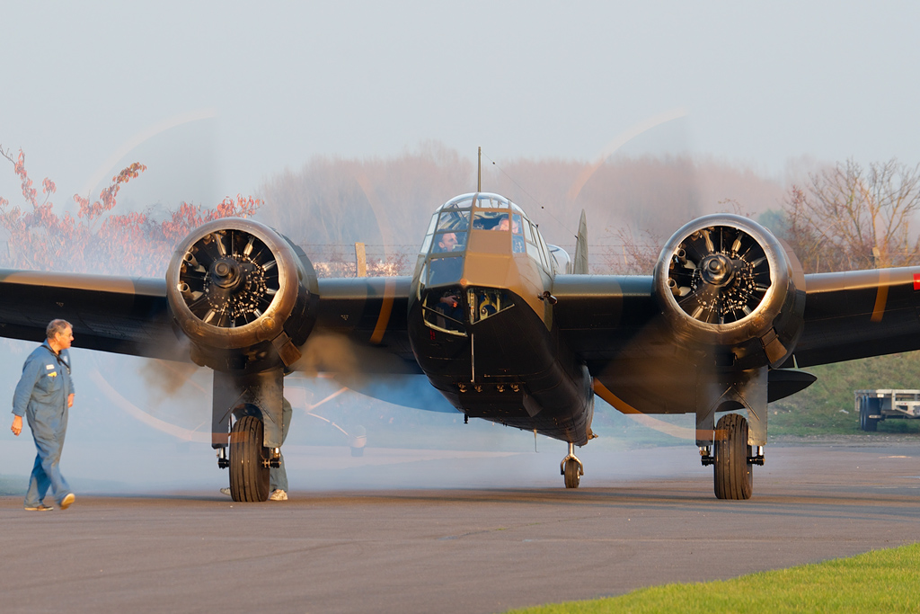 The Bristol Blenheim Flies! 11 John Romain starts the Blenheim's Bristol Mercurys in the typical cloud of smoke produced by every radial engine. (photo by George Land via Global Aviation Resource)