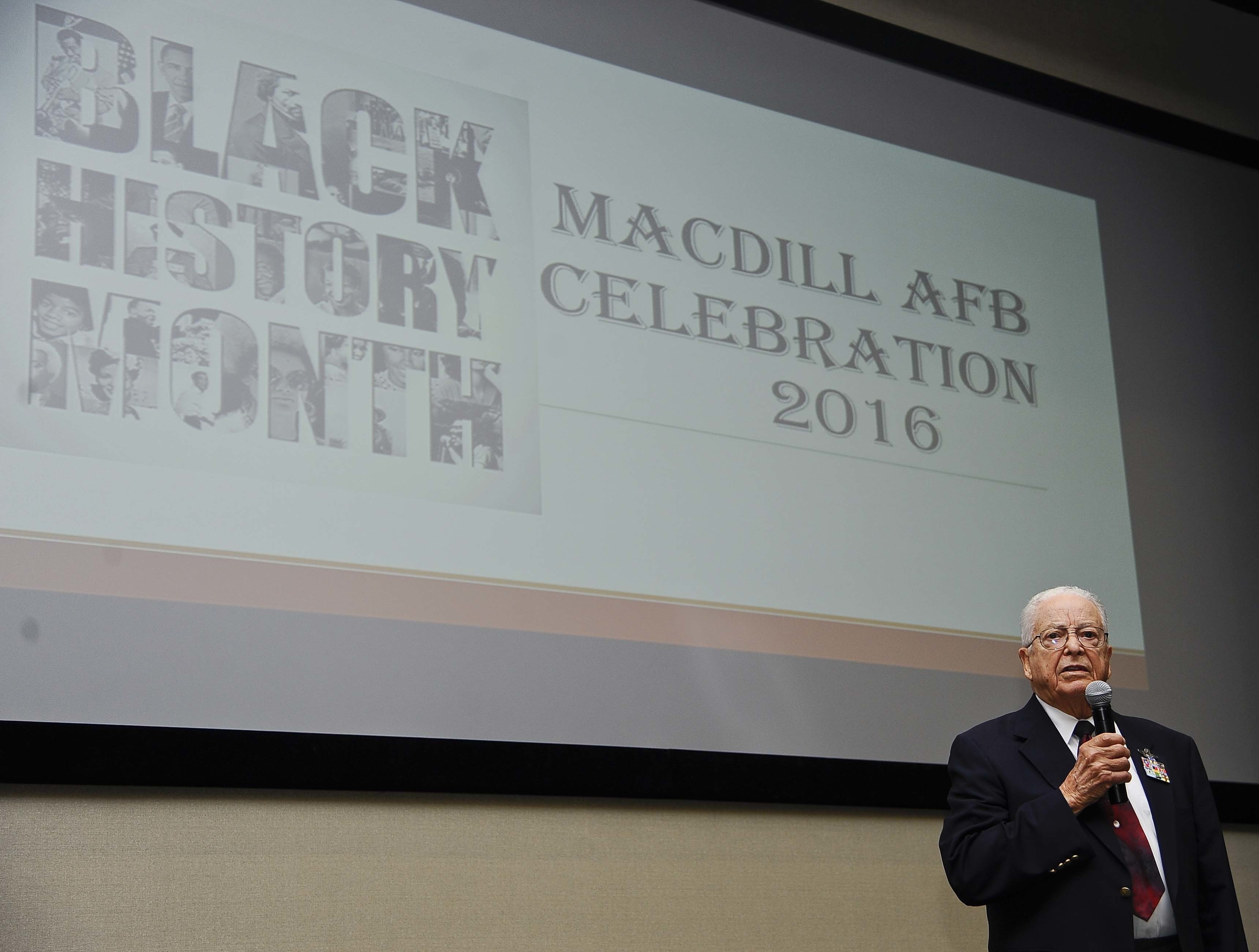 MacDill AFB Hosts a Tuskegee Airman 11 Retired Lt. Col. George E. Hardy, a Tuskegee Airman, gives a speech during the “A Salute To A Living Legend” event at MacDill Air Force Base, Fla., Feb. 11, 2016. In September of 1944, he was assigned to the famous 99th Fighter Squadron, 332nd Fighter Group at Ramitelli Air Base, Italy, where he would participate in 21 escort and strafing missions over Europe. (Photo by SrA Vernon Fowler)