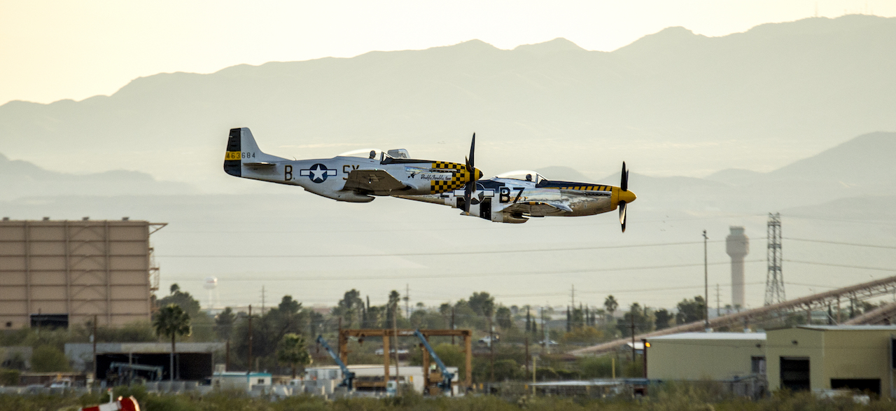 Heritage Flight: Heroes, Inspiration, Joy and Closure 12 Two P-51D Mustangs that were among the vintage fighter aircraft participating in the Heritage Flight Training Course at Davis-Monthan AFB, Tucson, Ariz., Mar 3, 2016, make a low pass in formation over the airfield . (U.S. Air Force photo by J.M. Eddins Jr.)