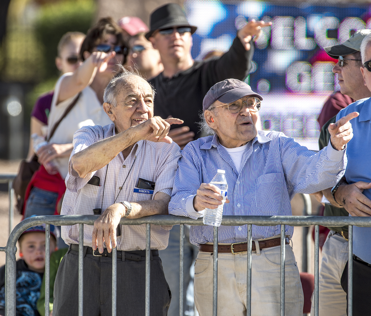 Heritage Flight: Heroes, Inspiration, Joy and Closure 17 Fred Roberts, 93, and Bill Lyons, 94, both P-51D pilots in Europe during WWII watch a formation of vintage and modern fighters fly past during the Heritage Flight Training Course at Davis-Monthan AFB, Tucson, Ariz., Mar 5, 2016. (U.S. Air Force photo by J.M. Eddins Jr.)
