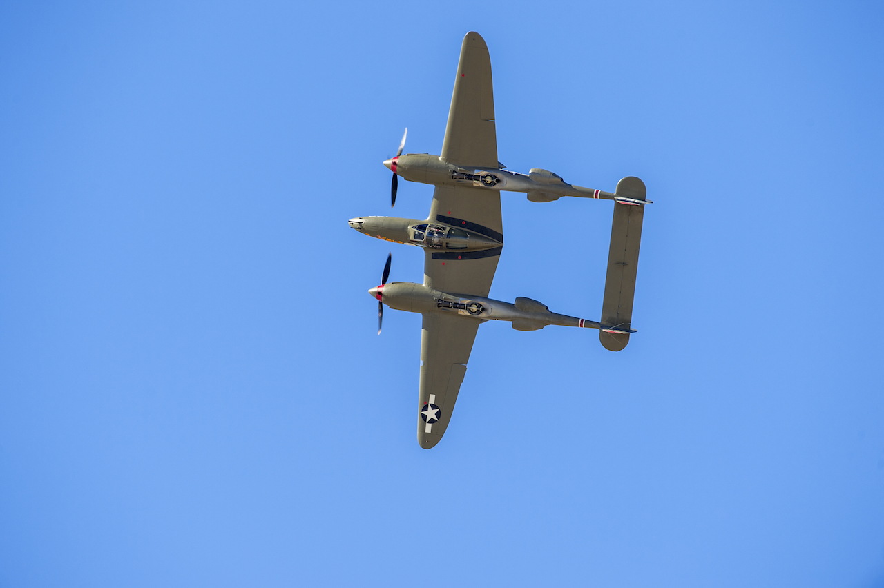 Heritage Flight: Heroes, Inspiration, Joy and Closure 16 A P-38 Lightning performs a barrel roll at the finale of a formation practice flight during the Heritage Flight Training Course at Davis-Monthan AFB, Tucson, Ariz., Mar 5, 2016. (U.S. Air Force photo by J.M. Eddins Jr.)