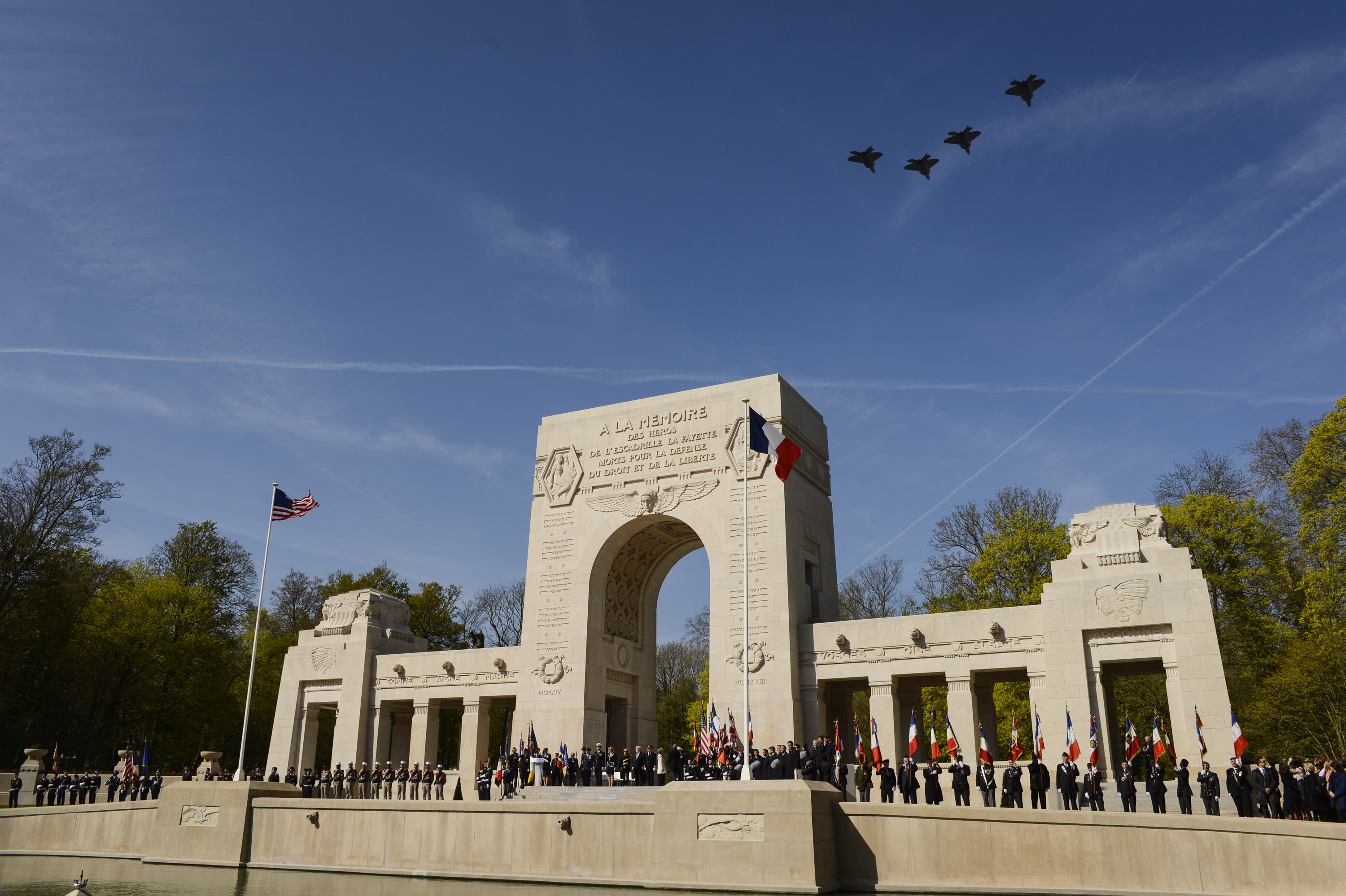 Lafayette Escadrille Honored at Centennial Event 12 Four U.S. Air Force F-22 Raptor fifth generation fighters fly over the Lafayette Escadrille Memorial in Marnes-la-Coquette, France, April 20, 2016, during a ceremony honoring the 268 Americans who joined the French Air Force before the U.S. officially engaged in World War I. In addition to the F-22s, a USAF B-52 Stratofortress bomber, three FAF Mirage 2000Ns, one FAF Rafale and a World War I-era Stearman PT-17 biplane performed flyovers during the ceremony commemorating the 100th anniversary of the Layfette Escadrille’s formation. Men of the Lafayette Escadrille and Lafayette Flying Crops were critical to the formation of the U.S. Air Force. (U.S. Air Force Photo by Tech. Sgt. Joshua DeMotts/Released)