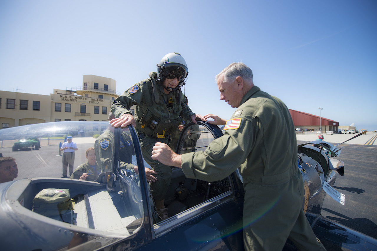 Legendary Ace Flies His 100th Aircraft in "the Birthplace of Naval Aviation" 12 Retired Cmdr. Dean "Diz" Laird walks into the rear seat of a T-34C Turbomentor with the "Flying Eagles" of Strike Fighter Squadron (VFA) 122. The T-34C marks the 100th aircraft Laird has flown in his 95-year lifetime. (U.S. Navy photo by Mass Communication Specialist 2nd Class Paolo Bayas/Released)