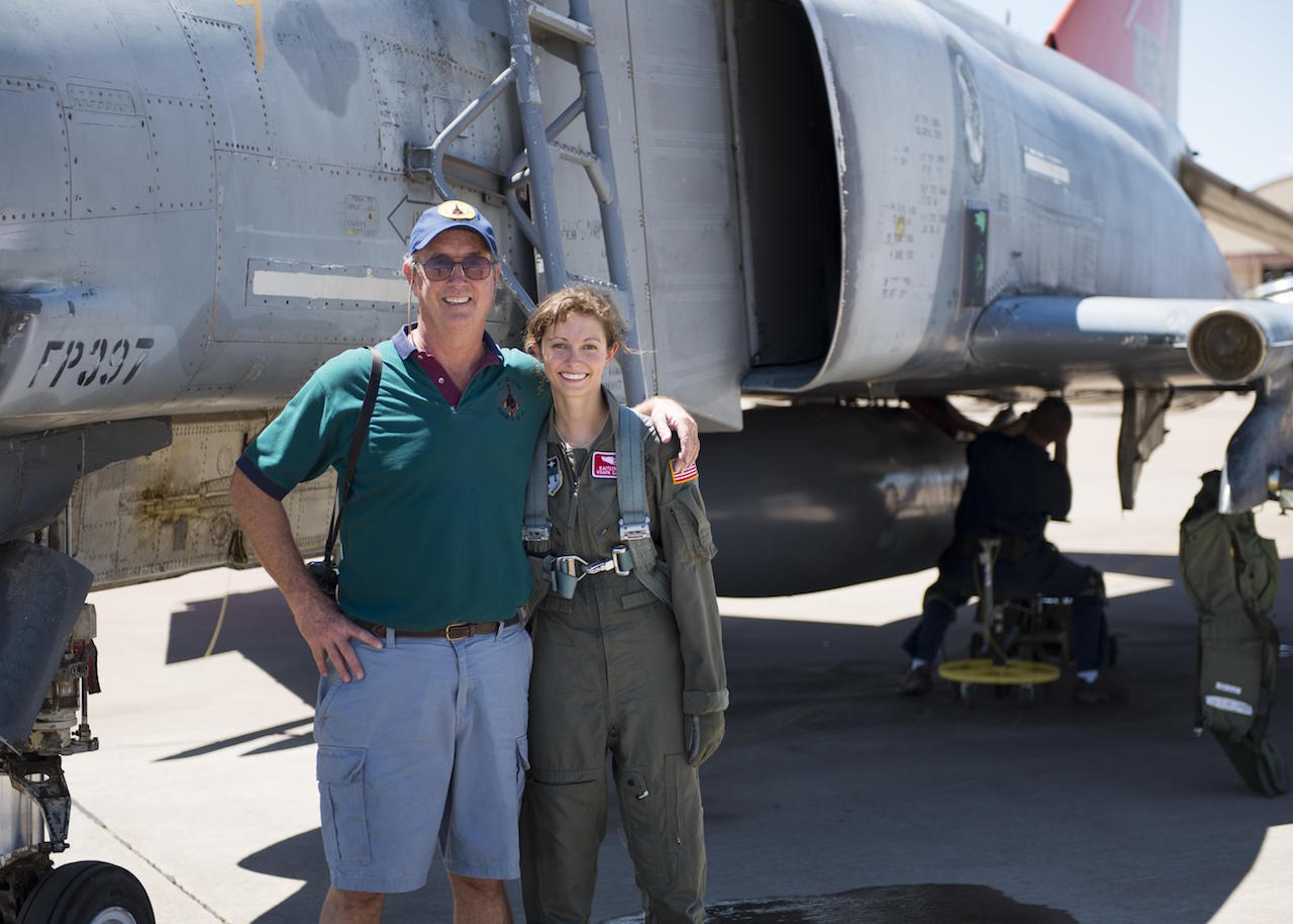 A Family Tradition 11 Retired Col. David and his daughter, Cadet 2nd Class Kaitlyn, stand next to an F-4 Phantom on July 12, 2016 at Holloman Air Force Base, N.M. Kaitlyn flew with Lt. Col. Ronald King, the commander of Detachment 1, the same detachment her father commanded from 1992-1994.