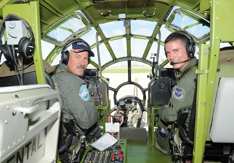 Brig. Gen. Paul Tibbets IV Flies B-29 "Doc" 10 Mark Novak, left, a B-29 Superfortress pilot and Brig. Gen. Paul Tibbets IV, 509th Bomb Wing commander, Whiteman Air Force Base, Mo., pose for a photo inside Doc, a restored B-29 Superfortress, June 9, 2017, on McConnell AFB, Kan. Tibbets’ grandfather, retired Brig. Gen. Paul Tibbets Jr., piloted the B-29 during WWII. (U.S. Air Force photo/Senior Airman Tara Fadenrecht)