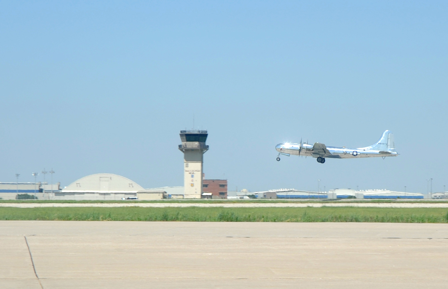 Brig. Gen. Paul Tibbets IV Flies B-29 "Doc" 11 Doc, a restored B-29 Superfortress, takes-off June 9, 2017, from McConnell Air Force Base, Kan. Brig. Gen. Paul Tibbets IV, 509th Bomb Wing commander, Whiteman Air Force Base, Mo., co-piloted Doc, during this flight. Tibbets piloted the aircraft to Whiteman AFB for an airshow. (U.S. Air Force photo/Staff Sgt. Rachel Waller)