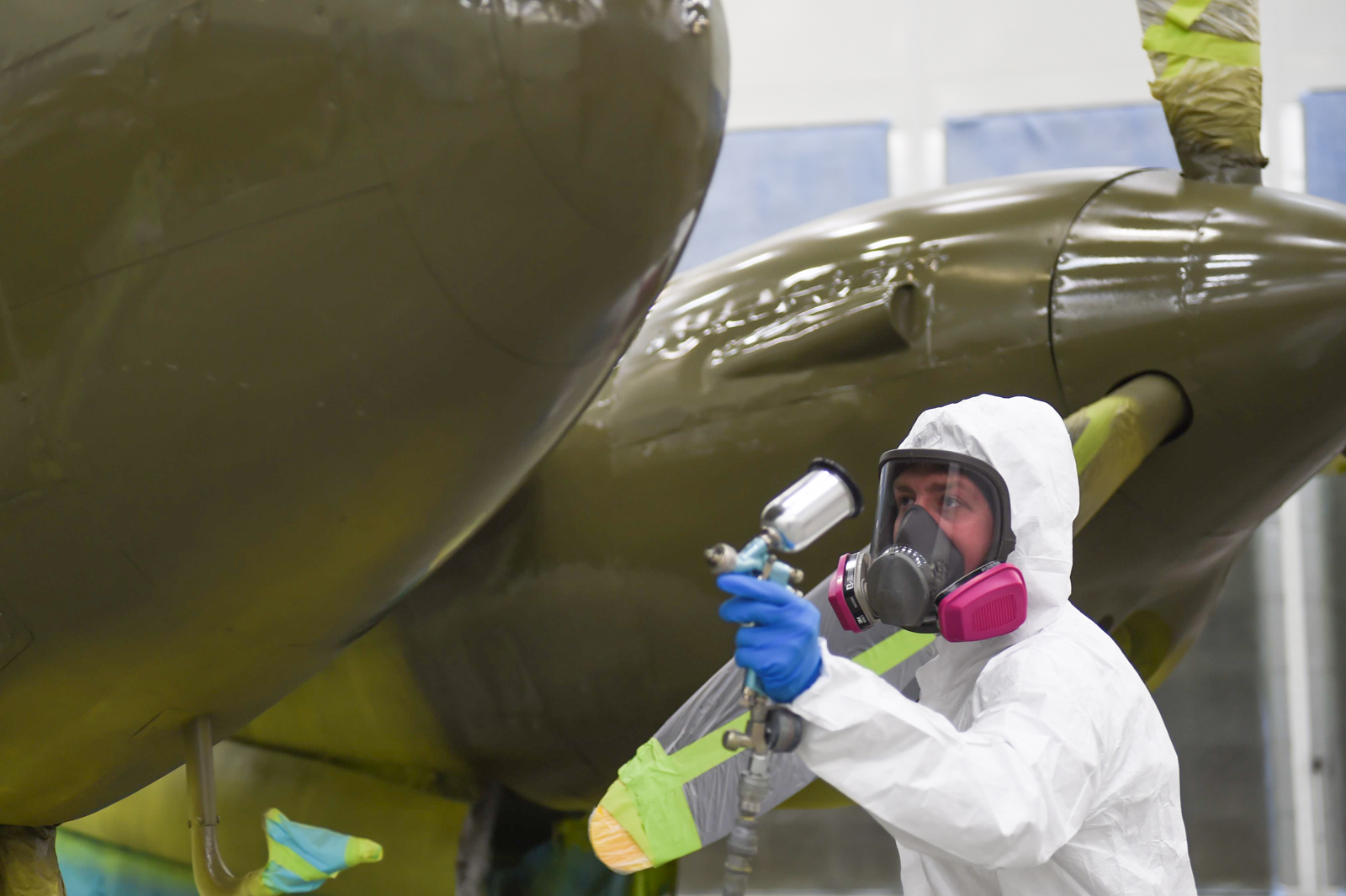 P-38G Lightning Under Refurbishment in Alaska 13 Air Force Senior Airman Kurtis Steinecke paints a P-38G Lightning inside Hangar 21before it can be returned to the Heritage Park at Joint Base Elmendorf-Richardson, Alaska, July 17, 2017. Steinecke is one of the two Airmen who are putting the final touches on the aircraft. (Photo by Staff Sgt. Sheila deVera)