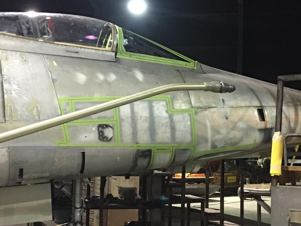 Museum of Aviation F-100 Super Sabre Goes on Display 12 Masking the parts prior to painting. (photo by Aaron Robinson)