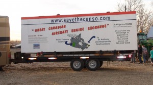 Canadians Band Together to Save and Restore a Consolidated PBY Canso 16 "Great Canadian Aircraft Engine Exchange" billboard attached to engine trailer for the trip (Image Credit: FARS)