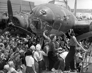 WWII B-24 Liberator Hot Stuff - Setting the Record Straight 14 Aug. 19, 1943: Throngs of female aircraft workers signing their names on the B-17 bomber Memphis Belle in Long Beach, California (Image Credit: Los Angeles Daily News Archive/ UCLA)
