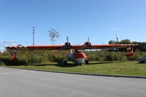 Canadian North Atlantic Aviation Museum Struggles for Public's Attention 13 Consolidated PBY Canso water bomber in the distinctive orange and green livery of the Government of Newfoundland and Labrador. (Image Credit: NAAM)