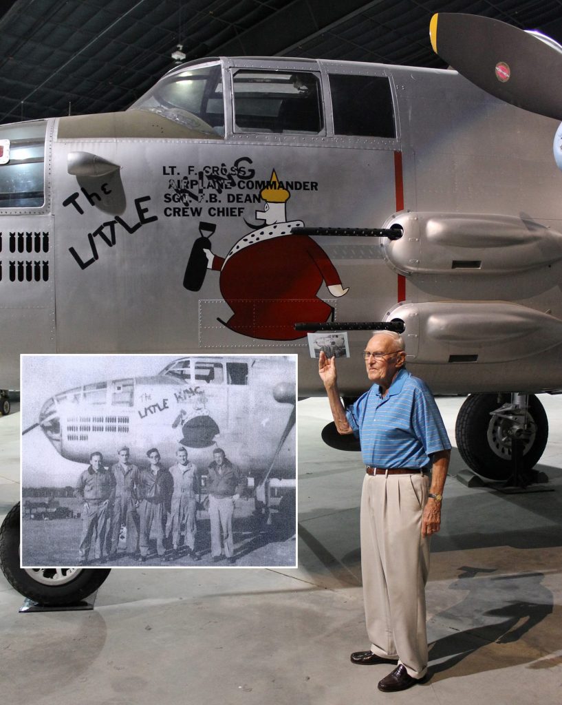 WWII Veteran Tail Gunner Visits the Tribute to the B-25 He Crewed 10 Tail Gunner Norris holds a copy of a photo that shows his crew standing by the original “The Little King.” In that photo (see inset), Norris is the second from the right. (Image Credit: Museum of Aviation)