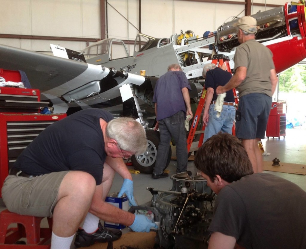 Behind the Scenes, Air Show Performers are Prepped for Action by CAF Dixie Wing 10 Open nose surgery. Members of CAF Dixie Wing pitch in to make repairs to their P-51-D "Red Nose" (Image Credit: CAF Dixie Wing)
