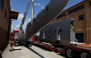 Howard Hughes Sikorsky S-43 Lands at Fantasy of Flight 15 S-43's wing sections being offloaded at Fantasy of Flight (Image Credit: Fantasy of Flight)