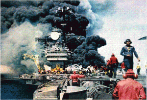 Some of the Most Important Planes on US Navy Carriers Never Fly 13 The Forrestal fire as viewed from the bow of the ship.