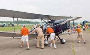 Vintage Wings of Canada Seeks Volunteers for Canada's Premiere Warbird Air Show 11 VWoC's orange-shirted volunteers helping to get the show in the air (Image Credit: VWoC)