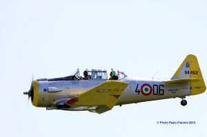 Air Show Report: HAG Flyparty 2013 was Full of Surprises 17 il Tricolore is waved from the rear seat of the ex-Italian Air Force T-6 Texan. (Image Credit: Paolo Franzini)
