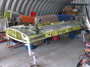 Restoration of Prototype XP-82 Twin Mustang Makes Progress 12 Center section, now horizontal and supported on its gear. (Image Credit: XP-82 Restoration Project)