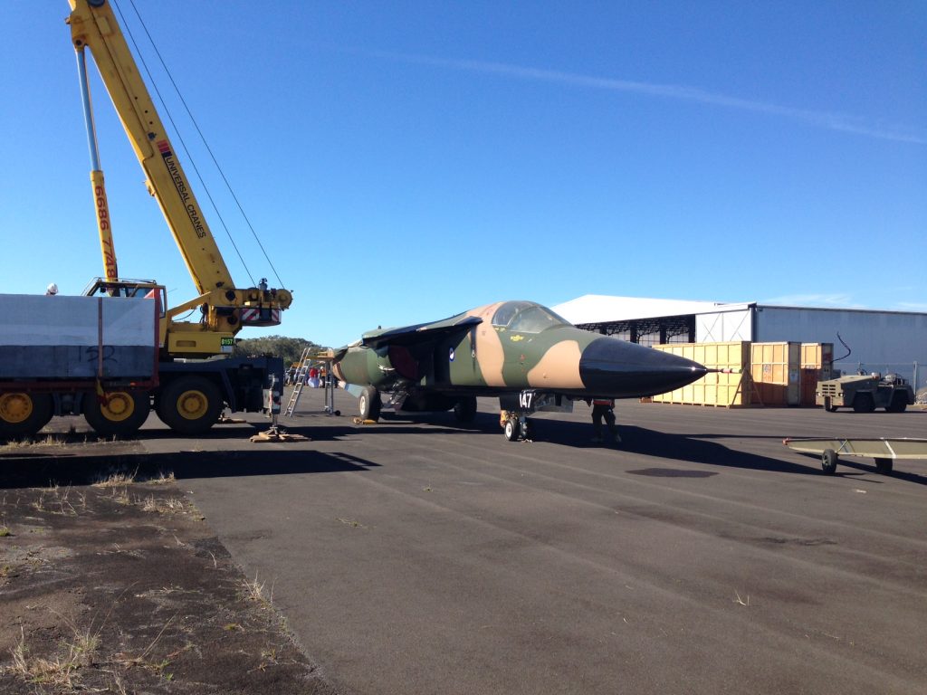 Final RAAF-Restored General Dynamics F-111 Arrives at Evans Head Memorial Aerodrome 10 F-111C A8-147 offloaded after its overland arrival at the Evans Head Memorial Aerodrome. (Image Credit: EHMAHAA)