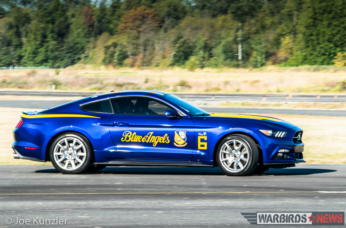 Props & Ponies at the Heritage Flight Museum - Air Show Report 18 A 2015 Ford Mustang painted as a tribute to the US Navy Blue Angels aerial demonstration team. (photo by Joe Kunzler)