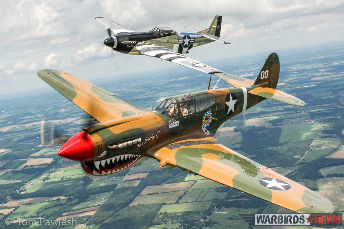 The Greatest Show on Turf 2017 - Geneseo Air Show Report 31 The American Airpower Museum's P-40M 'The Jacky C." flanked by Scott Yoak's P-51D 'Quick Silver'. (Photo by Tom Pawlesh)