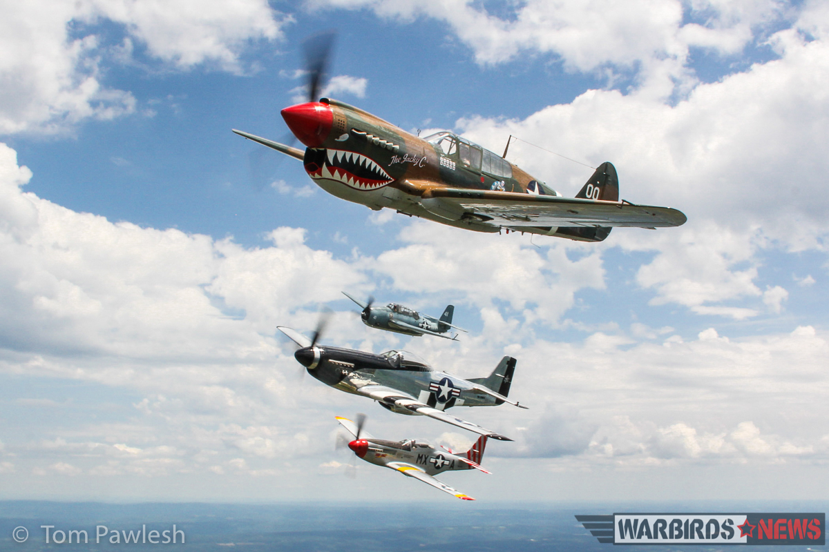 The Greatest Show on Turf 2017 - Geneseo Air Show Report 38 Another great air-to-air with the P-51s, P-40 and TBM. (Photo by Tom Pawlesh)