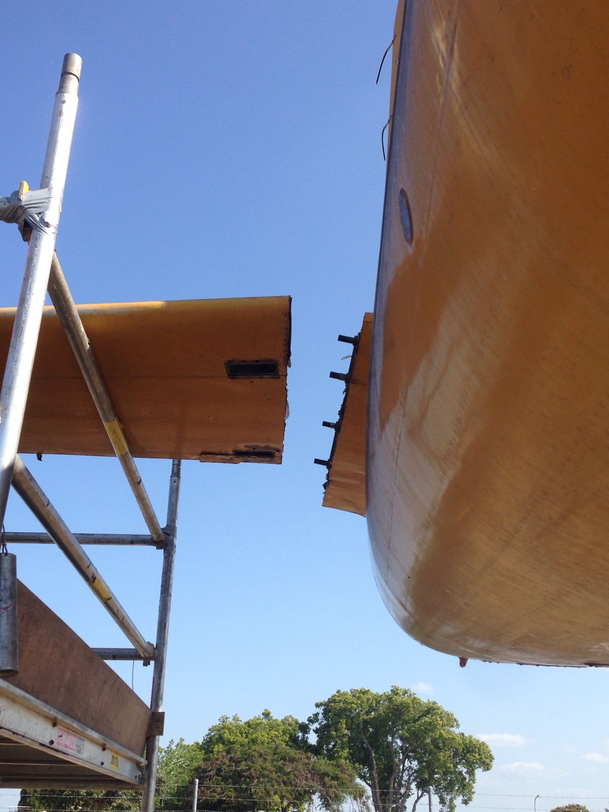 Douglas A-26 Invader Movements Downunder 14 Separating the starboard horizontal stabilizer from the airframe during the recent disassembly of Reevers' A-26 Invader. (Photo via Reevers)