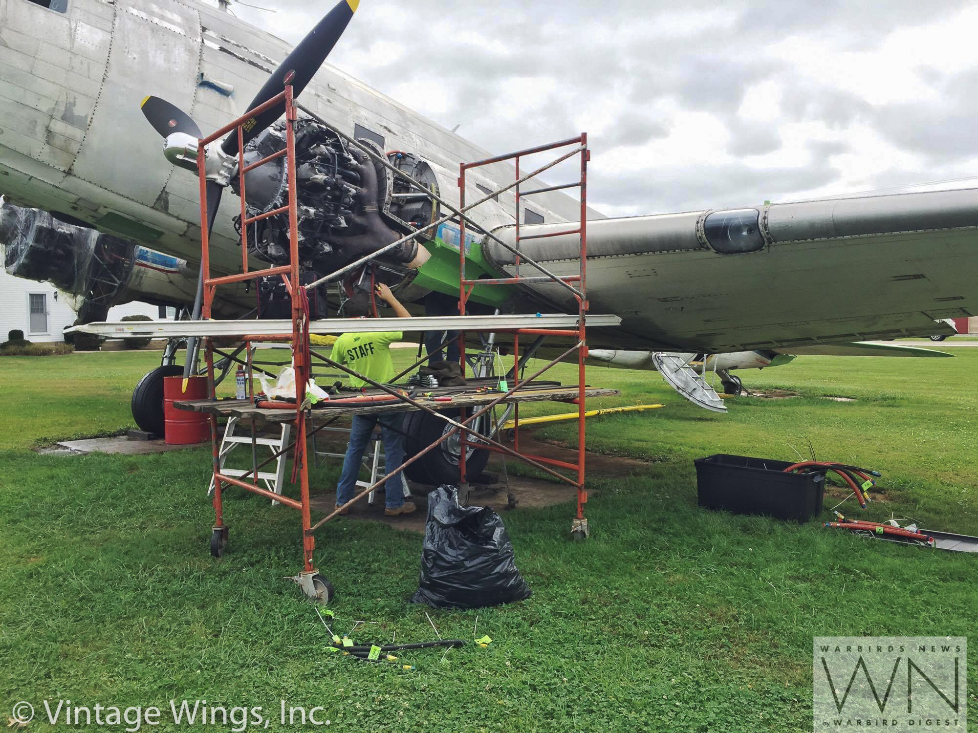 Restore the Roar - Help Get a WWII Veteran C-53 Skytrooper Back in the Air! 11 Scaffolding surrounds Beach City Baby's port engine as the crew works on it. (photo via Vintage Wings, Inc.)