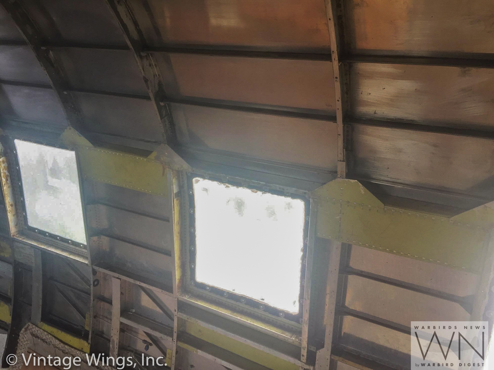 Restore the Roar - Help Get a WWII Veteran C-53 Skytrooper Back in the Air! 15 Inside the troop transport, we can see that the tired old executive interior is now a thing of the past. The restoration team has stripped it all out, and will begin replacing the seats with the style originally meant for the C-53 during WWII. (photo via Vintage Wings, Inc.)