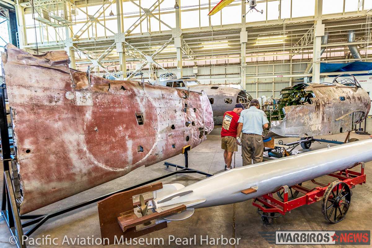 Nakajima B5N2 'Kate' Unveiled at Pacific Aviation Museum Pearl Harbor 18 An interesting view of the parts in position showing the faded paint of the original 'hinomaru' insignia. (photo via Pacific Aviation Museum Pearl Harbor)