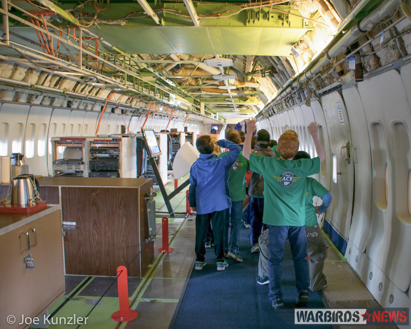 A Look Inside the Museum of Flight's New Aviation Pavilion 23 Aerospace Camp Experience (ACE) kids walking through the prototype 747. (photo by Joe Kunzler)