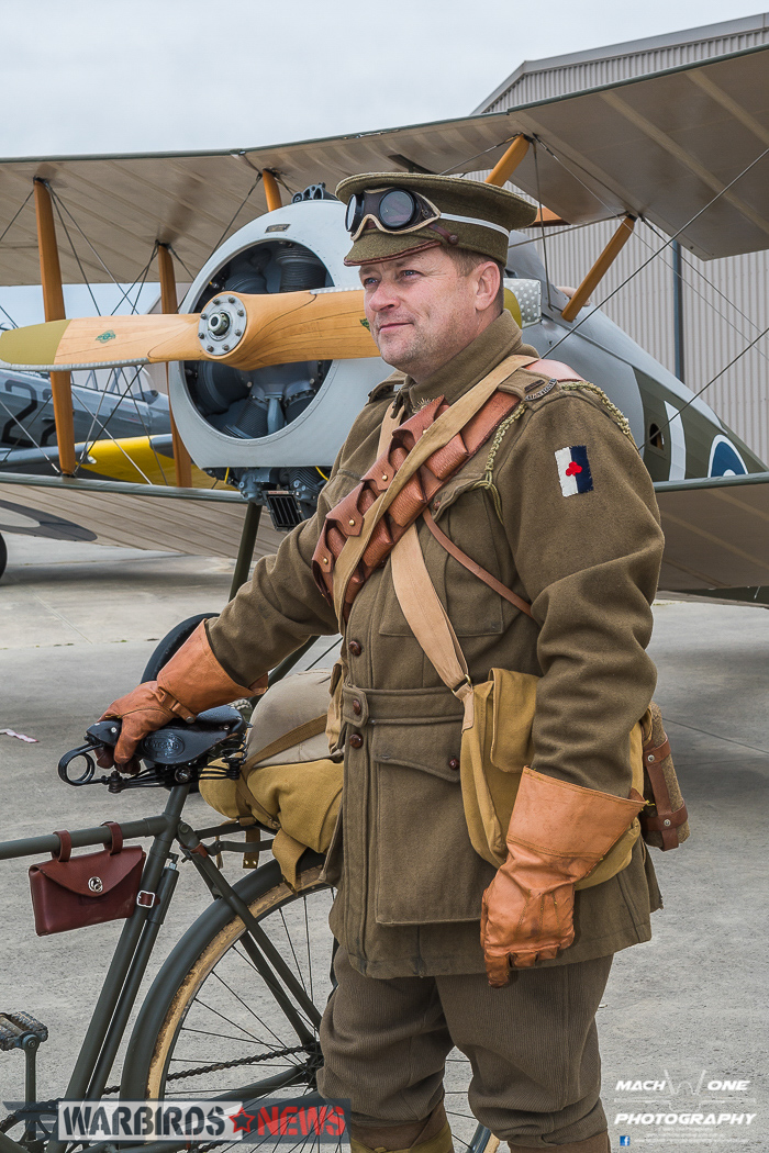 4 Squadron RAAF: Celebrating A Centenary - 1916 - 2016 12 A re-enactor standing in front of the Sopwith Snipe. (photo by Matt Savage)