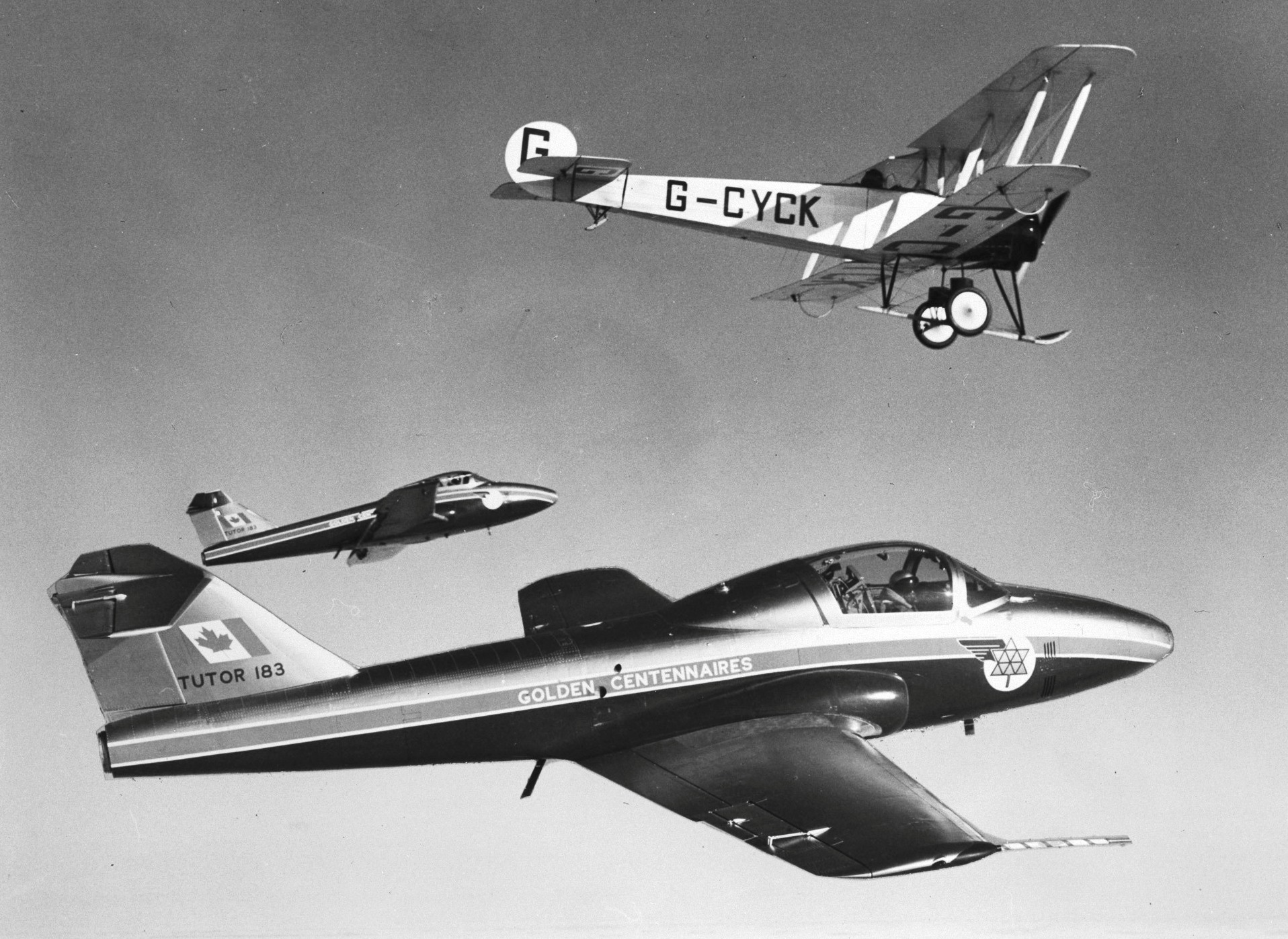 Today In Aviation History: Canadair CT-114 Tutor Enters RCAF Service 12 66a6d5f421dc110f082e92fa 60f8ba592622b48c91bcb0a3 Avro 504K Serial No D8971 C GYCK in flight with a pair of Canadair CT 114 Tutor trainers RCAFA