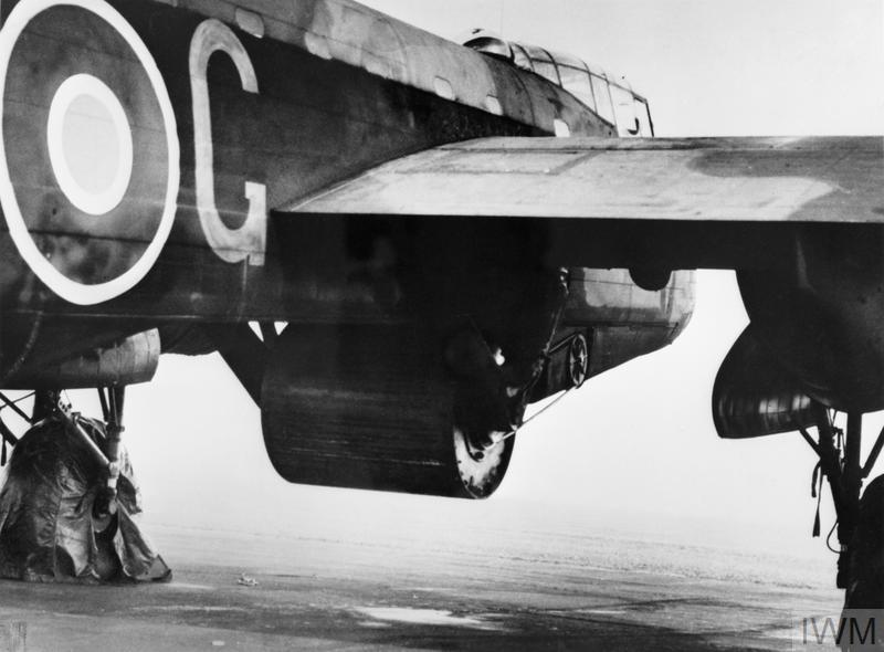 The Dambusters Raid - 80th Anniversary Commemorations 10 A practice Upkeep weapon attached to the bomb bay of Wing Commander Guy Gibsons Avro Type 464 Provisioning Lancaster ED932G AJ G at Manston Kent while conducting dropping trials off Reculver