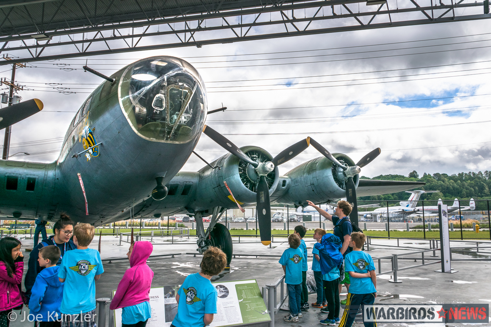 A Look Inside the Museum of Flight's New Aviation Pavilion 18 ACE Campers gaze at the Museum of Flight's Boeing B-17F Flying Fortress known as 'Boeing Bee'. (photo by Joe Kunzler)