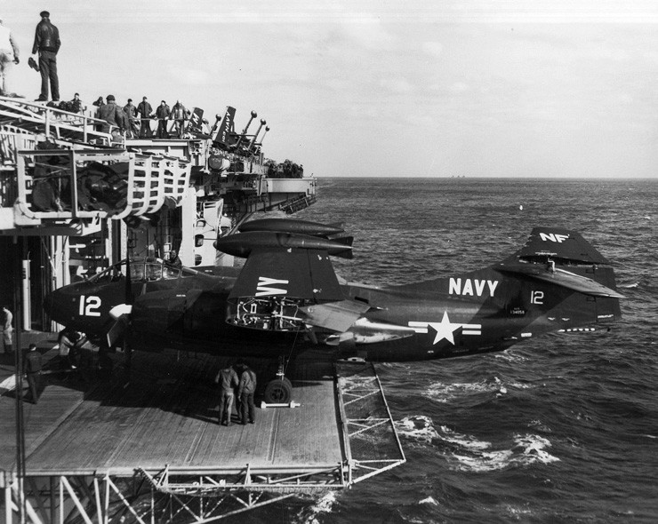 Today in Aviation History: First Flight of the North American AJ Savage 13 AJ 2 Savage on Aircraft Elevator on Board USS Yorktown CVA 10