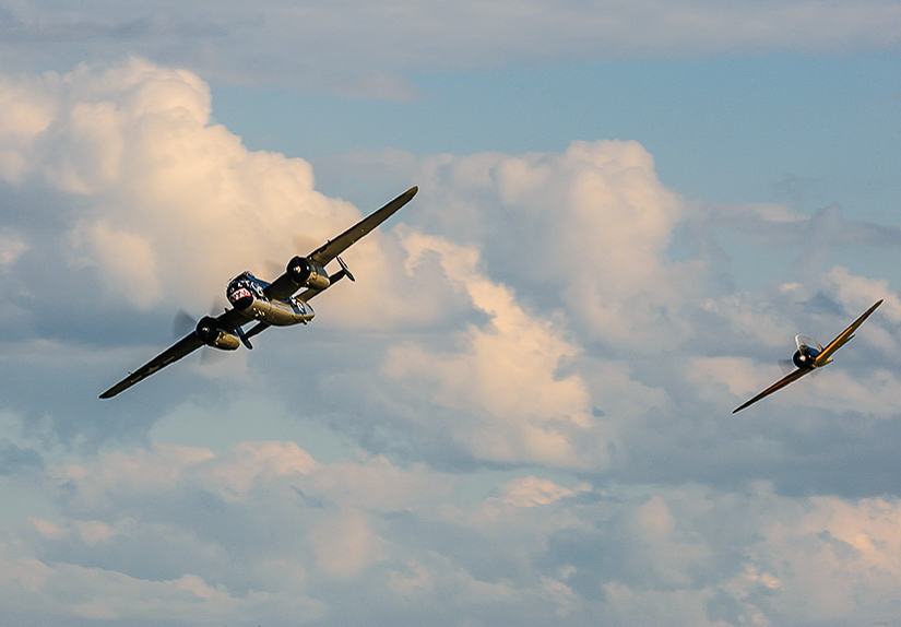 Texas Flying Legends - Oshkosh Here We Come!!! 13 TFLM's B-25 under attack by the Zero. (photo by Jake Peterson)