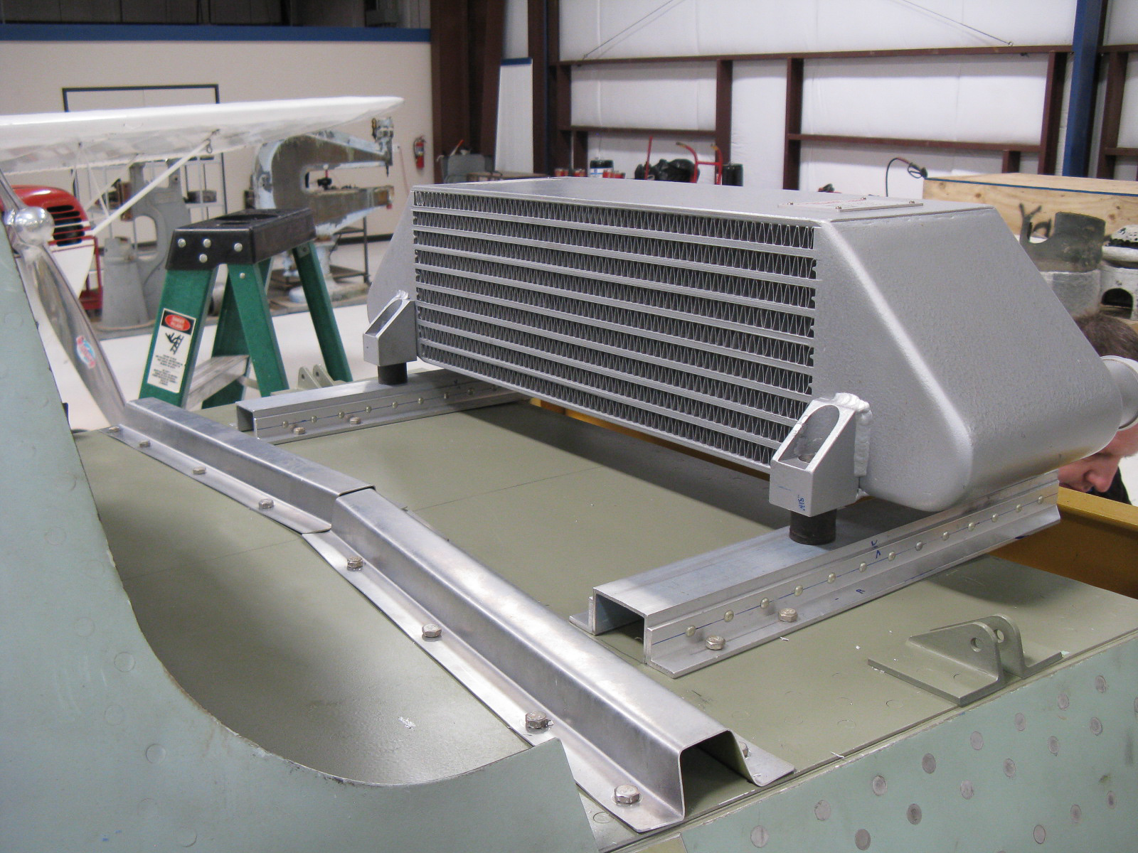 FW-190 First Flight At GossHawk Unlimited!!! 43 Aft oil cooler from Flug Werk mounted in the fuselage gun bay. (photo via GossHawk Unlimited)