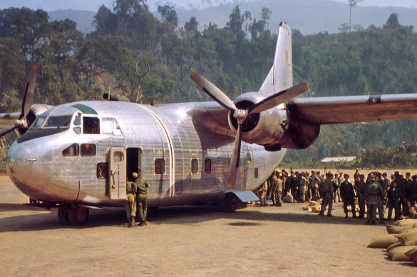Air America: Anything, Anywhere, Anytime, Professionally 11 An-Air-America-C-123-delivering-supplies-and-picking-up-Laotian-troops-at-Long-Tieng.-RLW-585x388