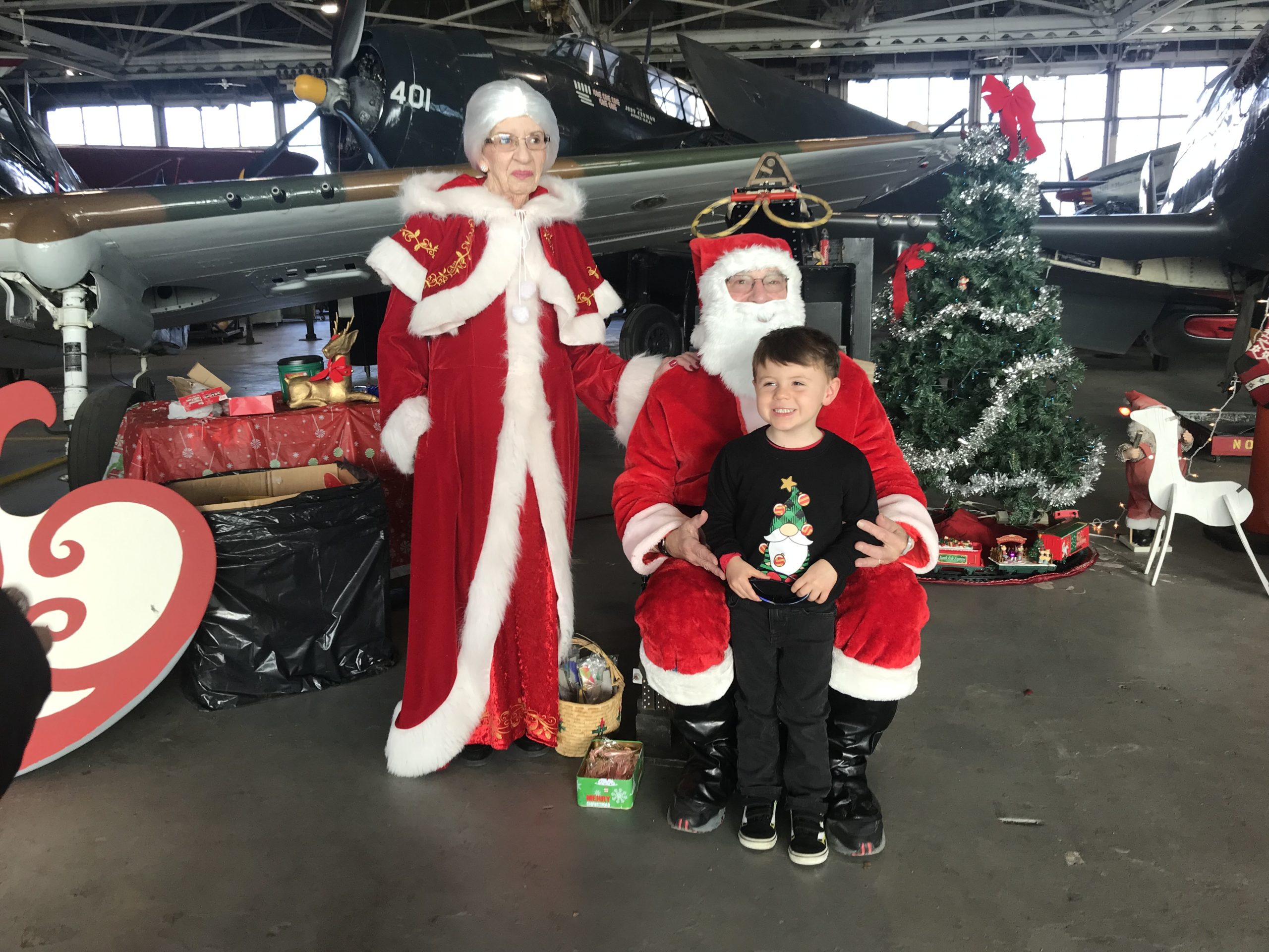 Breakfast, Santa, and Vintage Warbirds: A Holiday Tradition Returns to the American Airpower Museum 11 Annual Holiday Pancake Breakfast with Santa at The American Airpower Museum scaled