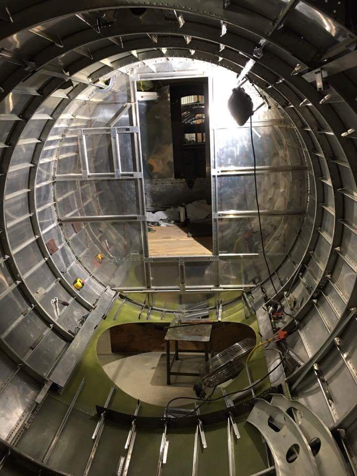 B-17E “Desert Rat” - October 2017 Restoration Update 13 Desert Rat's fuselage interior. The hole in the floor will one day hold the ball turret, and the radio room bulkhead is just beyond. (photo via Vintage Aviation Museum)