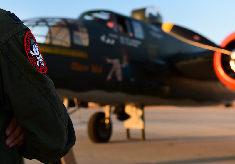 13th Bomb Squadron: “Appropriating” Bomber Once Again 11 A B-2 Spirit Bomber pilot, from the 13th Bob Squadron (BS) stands in front of a North American B-25 Mitchell at Whiteman Air Force Base, Mo., June 11, 2017. The 13th BS has participated in every war since World War I and celebrated 100 years of service on June 14, 2017. (U.S. Air Force photo by Tech. Sgt. Tyler Alexander)
